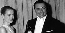 Borgnine receiving his Oscar from Grace Kelly in 1955