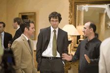 Armando Iannucci, right, with Tom Hollander and Chris Addison onset