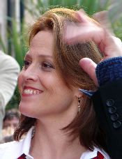 Sigourney Weaver waves to a fan at the premiere of Snow Cake