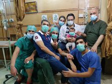 Hamza, Sama and the staff of al-Quds hospital, which Hamza set up in 2012 in east Aleppo