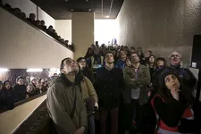 Crowds gather for Every Wall Is A Screen
