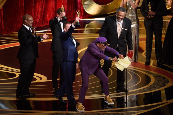 Spike Lee celebrates his win for Best Adapted Screenplay