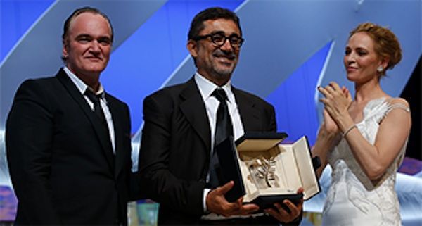 Quentin Tarantino and Uma Thurman present the Palme d'Or to Nuri Bilge Ceylan for Winter Sleep.