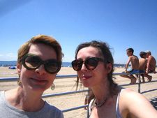 Amy Nicholson and Anne-Katrin Titze on the boardwalk at Coney Island Beach with some little fugitives