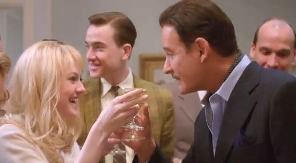 Errol Flynn (Kevin Kline) Beverly Aadland (Dakota Fanning) toast in The Last of Robin Hood: "And behind this facade of strength is actually someone who is thinking twice."