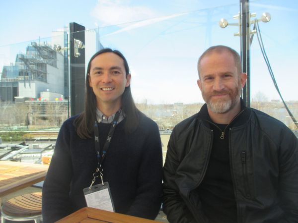 This Is Climate Change‬ creators ‪Danfung Dennis and Eric Strauss‬ on the STK Downtown rooftop with the Whitney Museum of American Art in the background