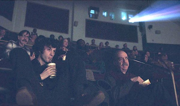 Angus Tully (Dominic Sessa) with Mr. Hunham (Paul Giamatti) watching Arthur Penn’s Little Big Man, starring Dustin Hoffman, in Alexander Payne’s multiple Oscar nominated The Holdovers