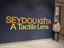 Ed Bahlman at the Seydou Keïta: A Tactile Lens exhibition at the Brooklyn Museum
