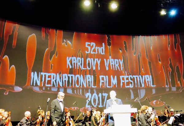 Blood and gore was the theme of the opening night of the Karlovy Vary International Film Festival, devised by brothers Michael and Simon Caban. The aim was to evoke gothic films from the silent era - accompanied by the ranks of the Karlovy Vary Symphony Orchestra. On stage, left, is Festival President Jiří Bartoška.