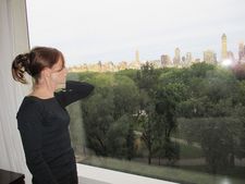 Isabelle Huppert looking out onto Central Park