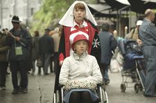 Maria (Léa Seydoux) pushes Christine’s (Sylvie Testud) wheelchair through Lourdes