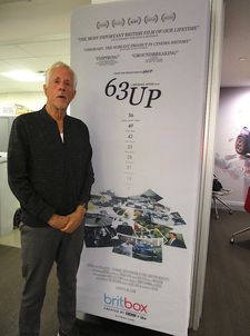 Michael Apted with the 63 Up poster at BritBox in New York: “When we chose seven we didn't think it was going to be any more than one film.”