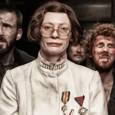 Tilda Swinton as Minister Mason in Snowpiercer with her fake medals, which Catherine George says were inspired by Gaddafi