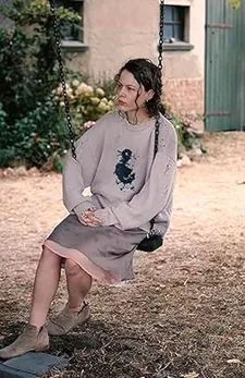 Christian Petzold on Laura (Paula Beer) in the deconstructed duck sweater: “A Japanese designer. I like it because she is wearing something she doesn’t like.”