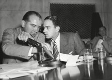 Roy Cohn whispers to Senator Joseph McCarthy at the Army-McCarthy hearings