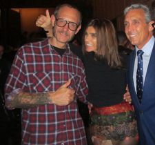 Terry Richardson and Carine Roitfeld, giving me the thumbs up with the evening's dapper host Charles Cohen.
