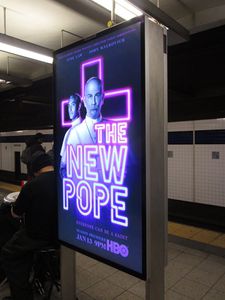 The New Pope NYC subway poster - costumes by Carlo Poggioli