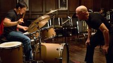 Miles Teller as a young jazz drummer under the tutelage of a maestro of jazz played by JK Simmons in Whiplash.