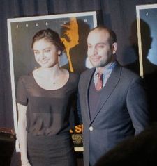 Ilan Eshkeri with Christine Evangelista at the New York premiere of Black Sea.