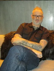 Denis Côté and a bearskin:  "I love to twist reality. I like to be one foot outside of it."