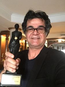Jafar Panahi with his award