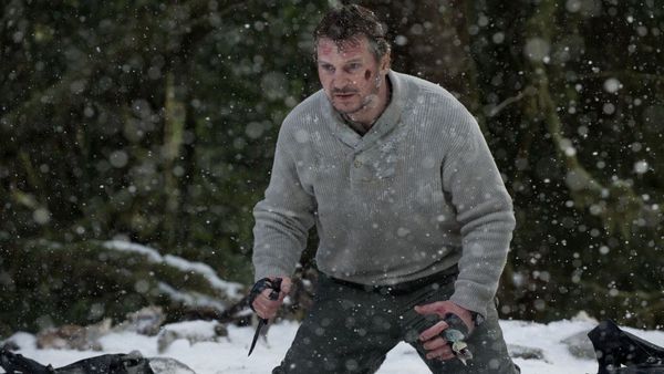 Liam Neeson faces off against a pack of wolves in The Grey