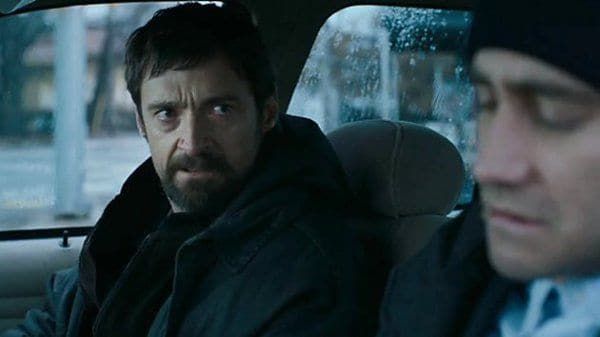 Hugh Jackman and Jake Gyllenhaal as Keller Dover and Detective Loki in Denis Villeneuve's Prisoners.