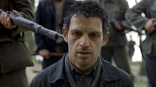 In the horror of Auschwitz, a prisoner (Géza Röhrig) forced to burn the corpses of his own people, tries to save a body he thinks is his son's from the flames in Son Of Saul. 