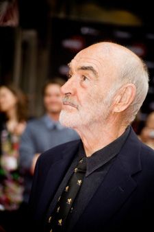 Sir Sean Connery greets the mounting crowd outside Edinburgh's Festival Theatre