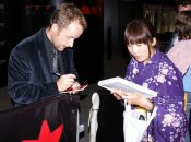 An overenthusiastic fan is welcomed by Billy Boyd - star of The Flying Scotsman