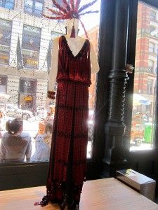 Prada's shop window - Cut-out leather-strip dress in oxblood <em>Photo: Anne-Katrin Titze