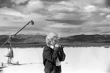 US actress Marilyn Monroe on the Nevada desert going over her lines for a difficult scene she is about to play with Clarke Gable in the film 