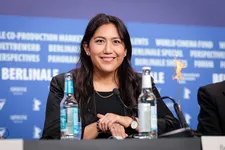 Beth de Araújo answers questions from the press