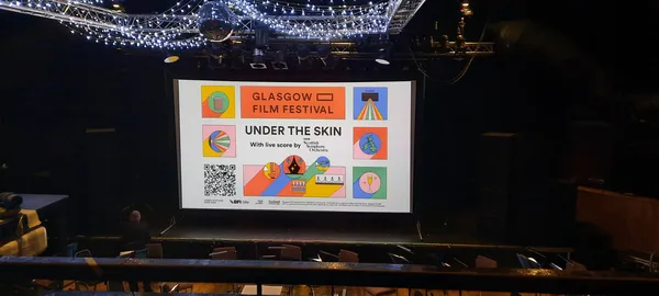 Projection equipment through Glasgow film. Musicians from Scottish Symphony Orchestra. Industrial void venue's own.