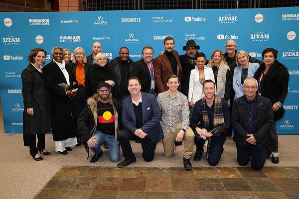 Top End Wedding red carpet at Sundance. Miranda Tapsell, Wayne Blair and Gwilym Lee, fifth, sixth and seventh from right back row. Joshua Tyler, second left front row