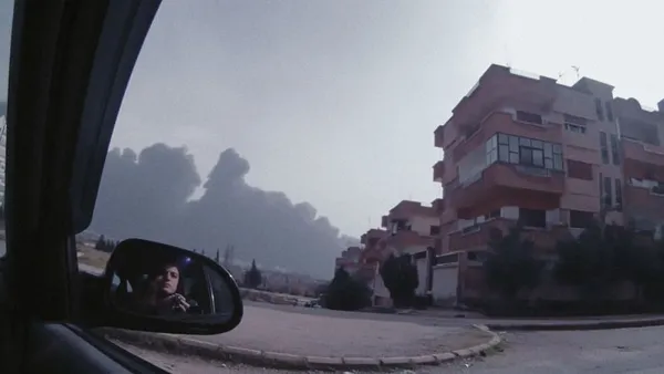 5 Seasons of Revolution. Lina: 'Coming from the news industry and journalism, I know that the headline focus is always, 'if it bleeds, it leads'. They go to the battles, they go to the frontline, and it's never the full story there'