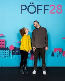 Emilios Avraam and Niovi Charalambous on the black carpet in Tallinn