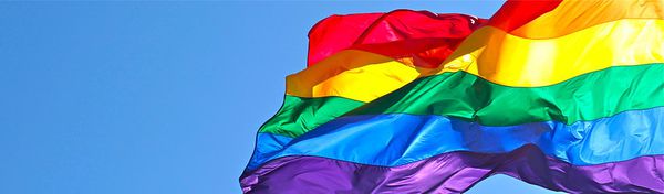 Rainbow flags are flown to celebrate Pride Month