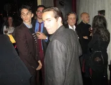 Alessandro Nivola with Michael Stipe against a wall