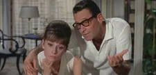 Audrey Hepburn and William Holden in Paris When It Sizzles plotting the “magnificently ingenious switch on the switch.”
