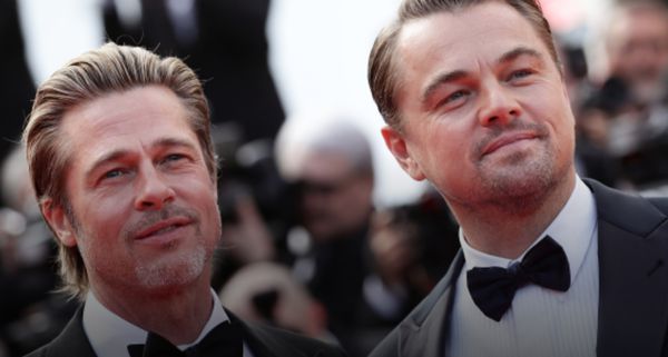 Brad Pitt and Leonardo DiCaprio greet the crowds for the first screening of Once Upon a Time in Hollywood