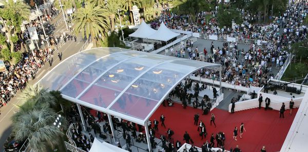The red carpet throng at the Cannes Film Festival where mask discipline has been observed to be lax