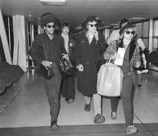Don Letts and John Lydon with Vivien Goldman at Heathrow airport to catch a flight to Jamaica: “I think she came over to interview Peter Tosh.”