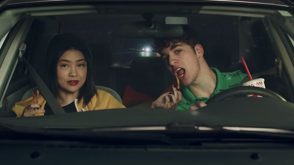 Twinkie (Sabrina Jie-A-Fa) and Egghead (Louis Tomeo) chow down on some fries during the long journey from Florida to Texas.