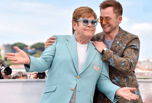 Elton John an his alter ego Taron Egerton up close and personal at the Cannes Film Festival for the Rocketman premiere