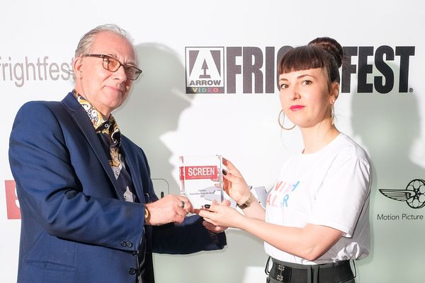 FrightFest’s Greg Day presents Prano Bailey-Bond with her award