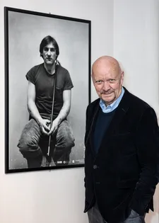 Jean-Paul Rappeneau beside an image of a youthful Gérard Depardieu when he visited the French Film Festival UK in 2018