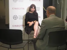 The Hummingbird director Francesca Archibugi with interpreter extraordinaire Michael Moore helping with the translating