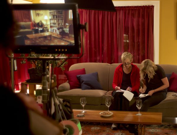 Wendy Jo Carlton and Rachel Paulson discuss script changes on the set of Good Kisser
