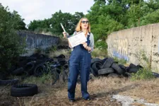 Gudrun Gut with the clapboard in her new miniseries GUT